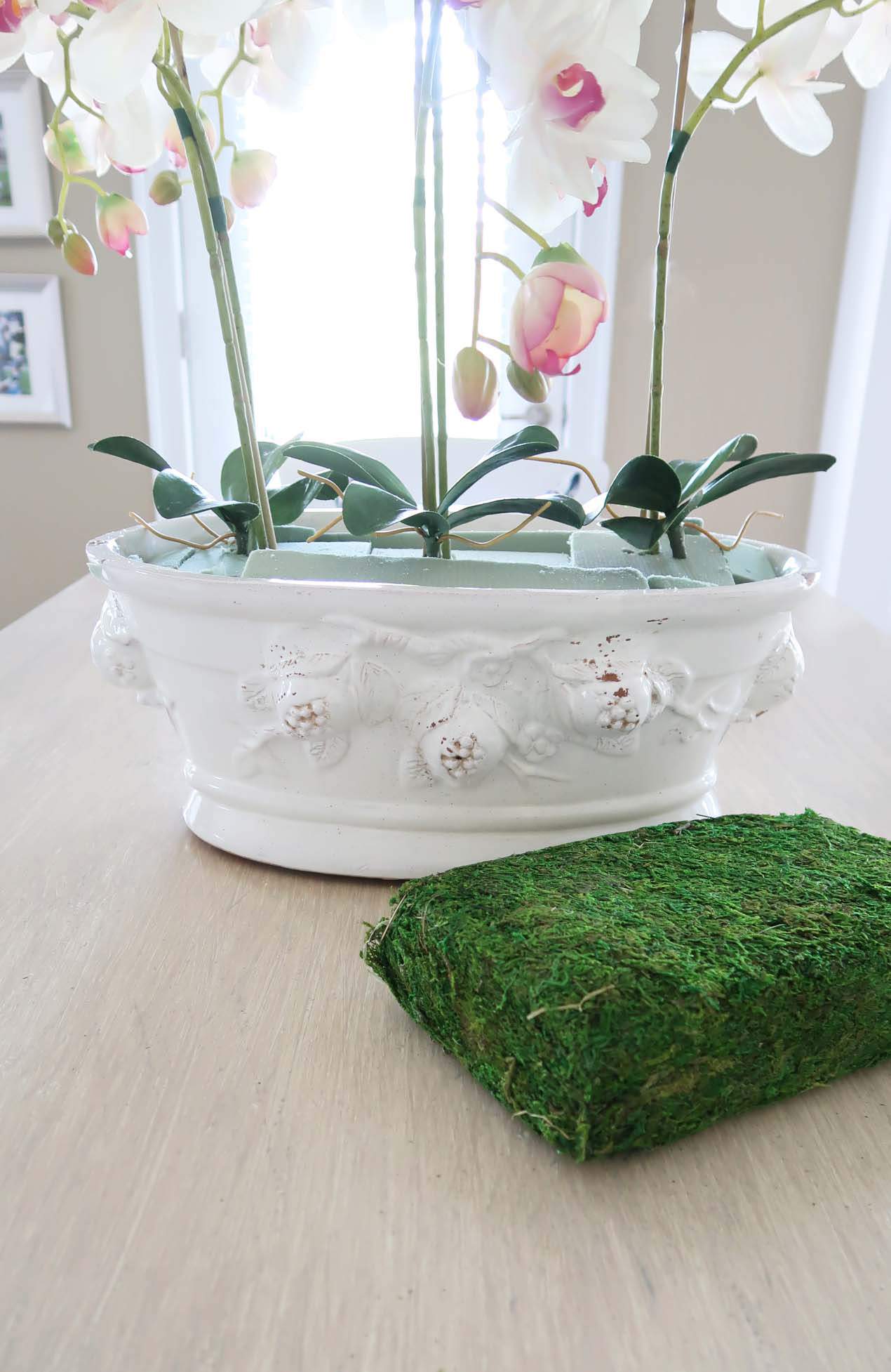 Green moss sheet for orchid arrangement