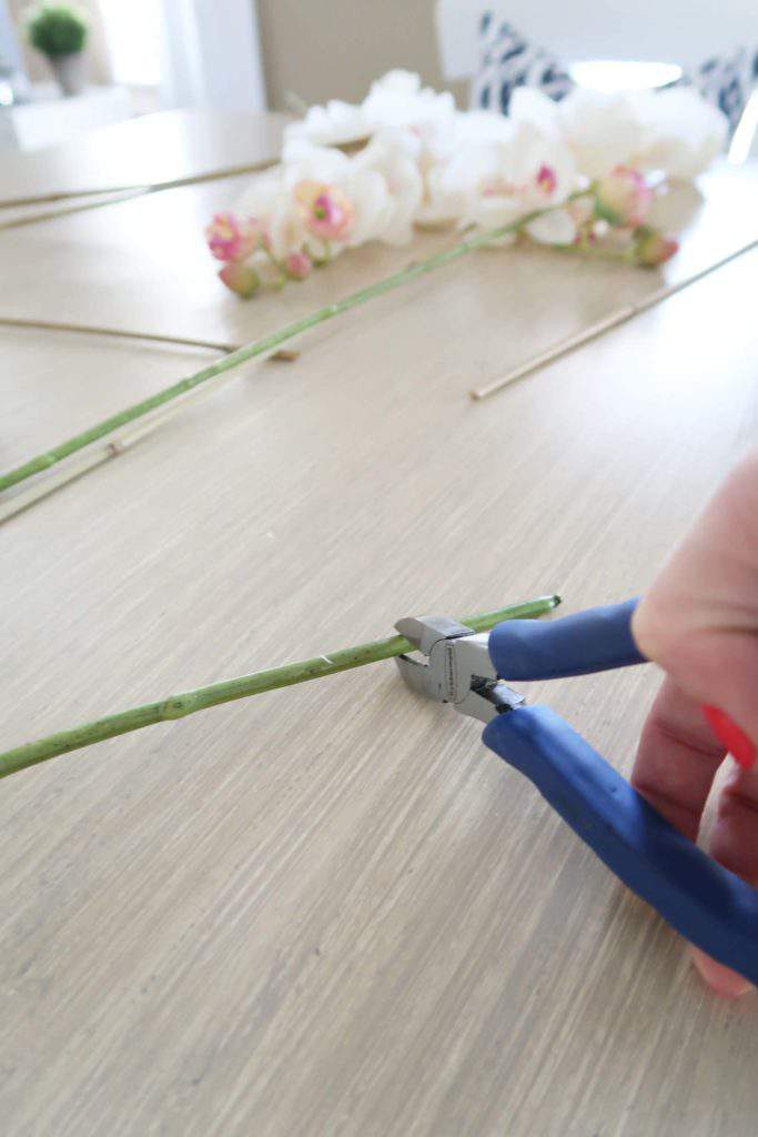 cutting faux flowers with wire cutters