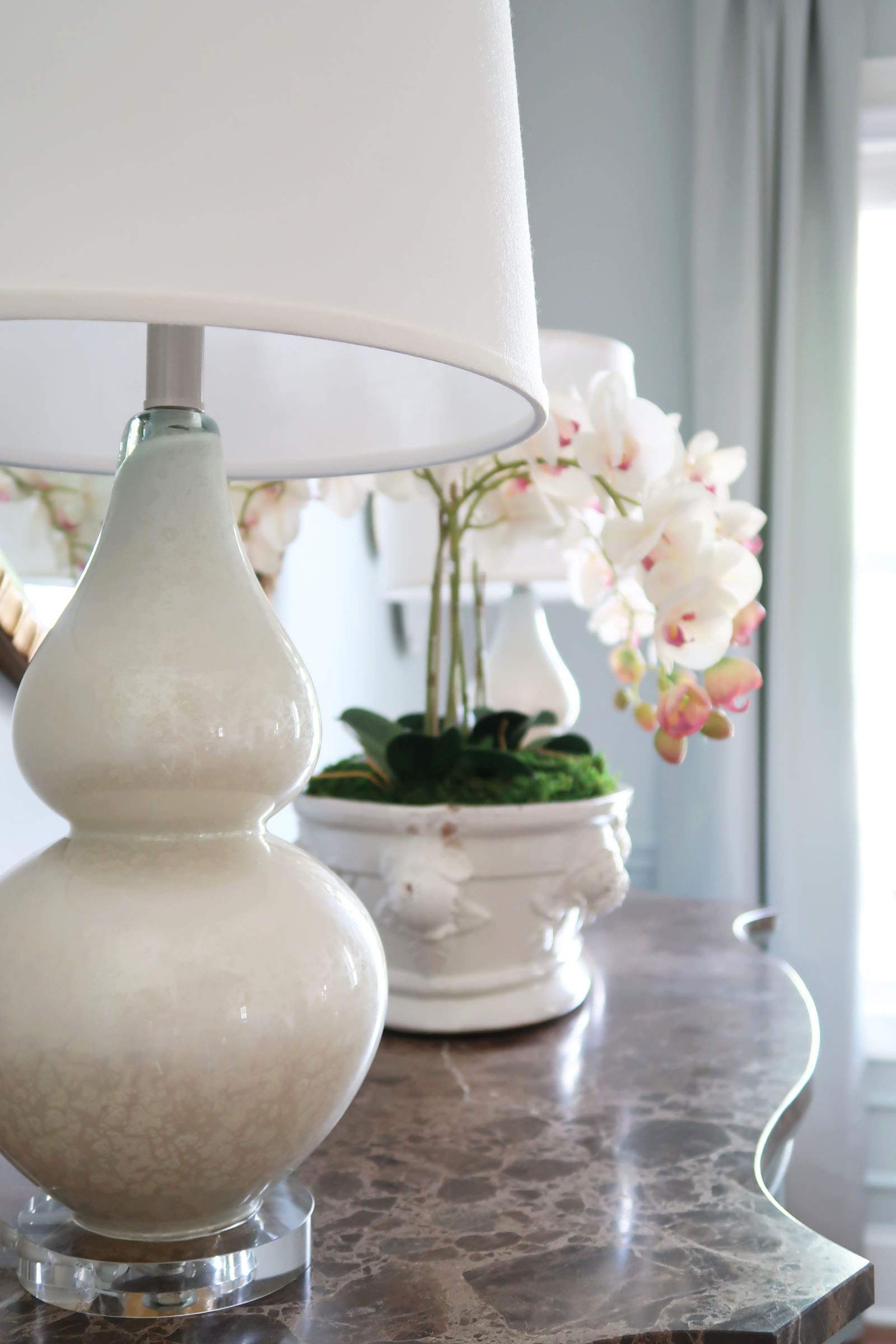 Two Pearlized Lamps on Credenza