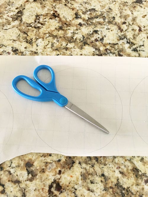 trace-plate-on-wrapping-paper-and-cut-out-with-scissors
