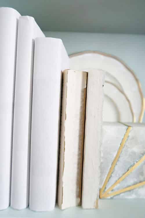 paper back books with binding removed in book case