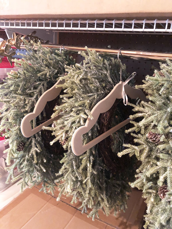 organize-wreaths-on-hangers