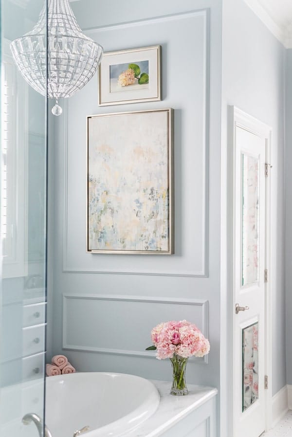 picture-frame-moulding-above-tub-nook-crystal-chandelier-pink-benjamin-moore-wales-gray-shadow-storm-marble-tub-deck-drop-in-tub-porch-daydreamer