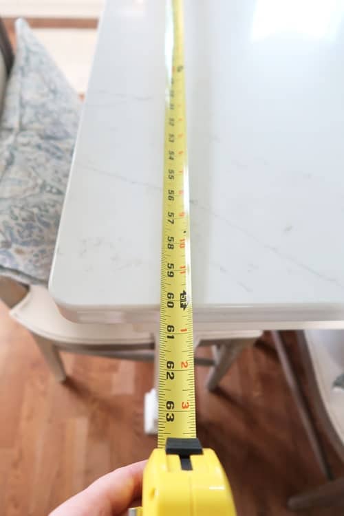 using-a-tape-measure-determine-width-of-kitchen-island