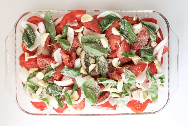 add-12-cloves-of-garlic-over-top-of-tomato-mixture_garden-fresh-marinara
