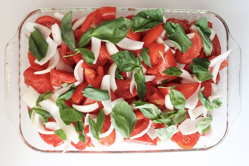 strip-basil-leaves-and-sprinkle-over-top-of-onions-and-tomatoes_garden-fresh-marinara