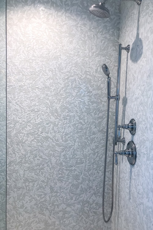 gray-and-white-flower-petal-mosaic-tile-shower