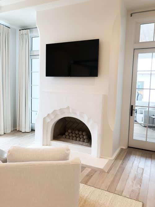 plaster-arched-fireplace-with-orbs