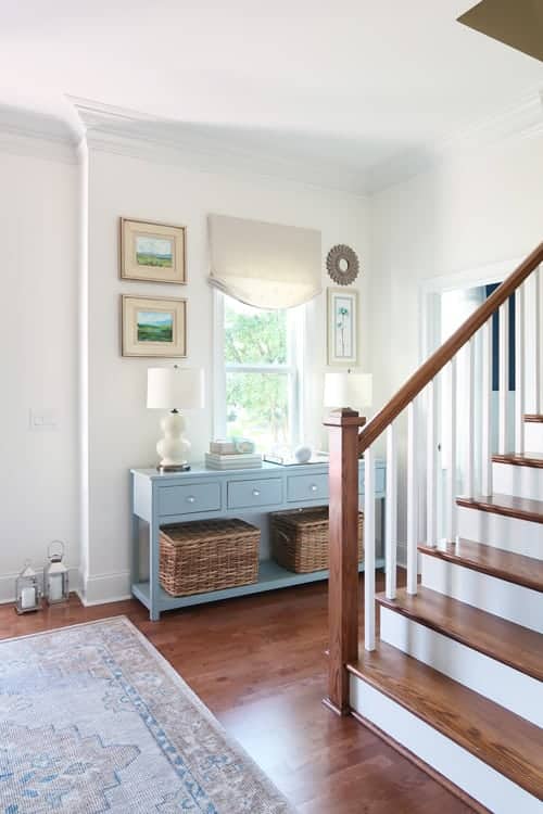 view-of-foyer-and-stairs-looking-at-credenza