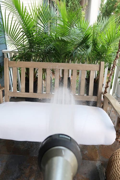 hose-off-swing-with-water-to-clean