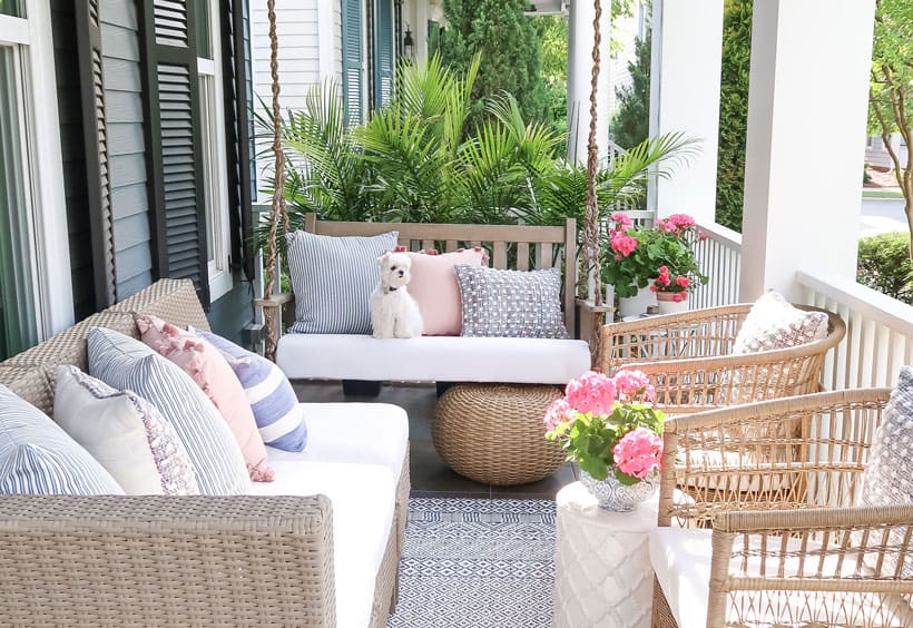 porch-porchdaydreamer-maltese-swing-blue-white-rug-target-chairs-small-front-porch