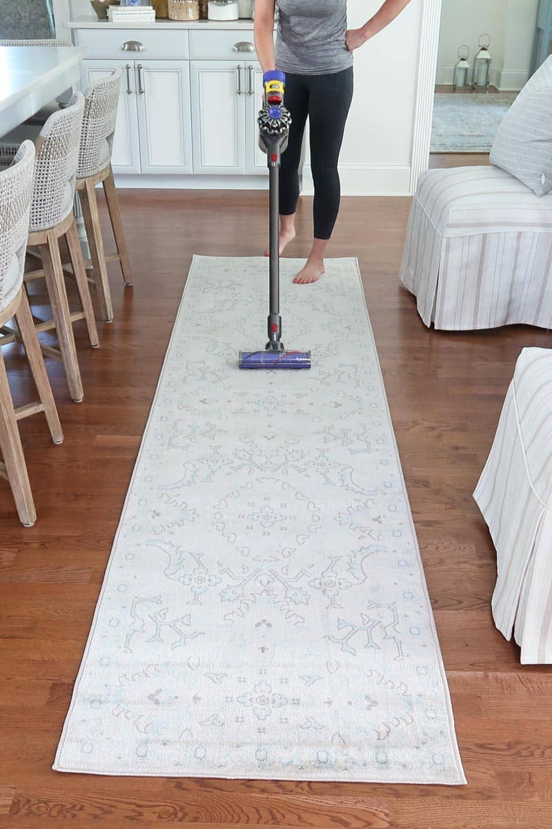 https://porchdaydreamer.com/wp-content/uploads/2020/06/after-ironing-rug-to-remove-wrinkles-vacuum.jpg