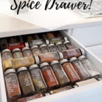 how-to-organinze-spice-drawer-glass-jars-white-sitcker-labels