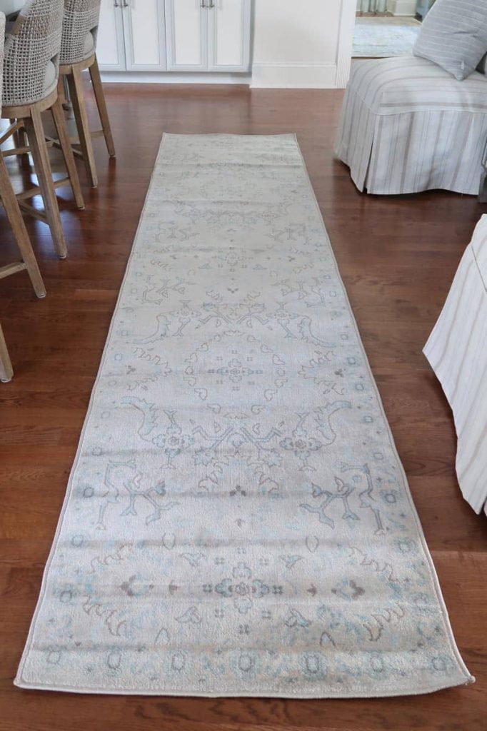 wrinkled creased area rug