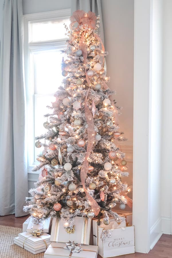 flocked-pink-and-gold-christmas-tree-in-blue-dining-room