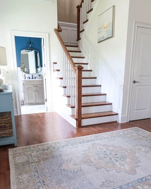 finn-pottery-barn-rug-review-foyer-blue-painted-console-powder-room