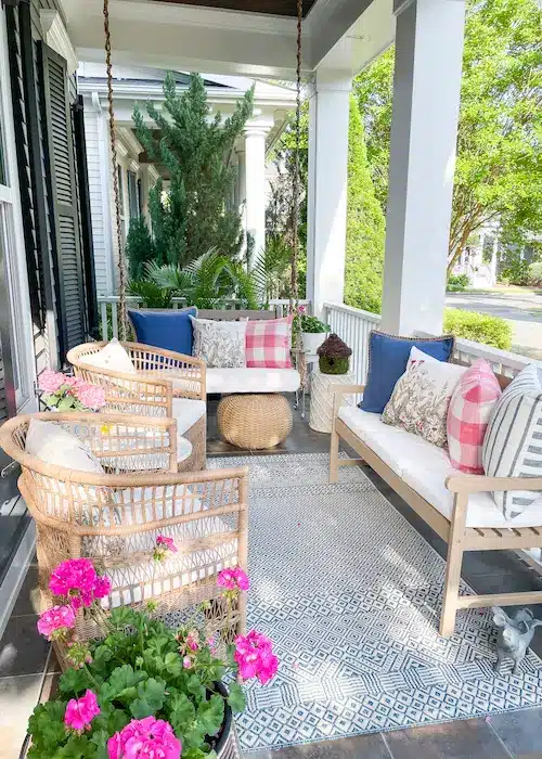 https://porchdaydreamer.com/wp-content/uploads/2021/04/charming-southern-front-porch-maximum-curb-appeal.webp