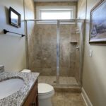 beige-tile-bathroom-shower-before-painting-tiles