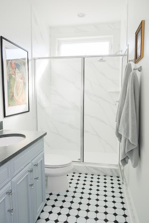 full-bathroom-reveal-painted-shower-tile-painted-granite-counter-peel-stick-tile-floor