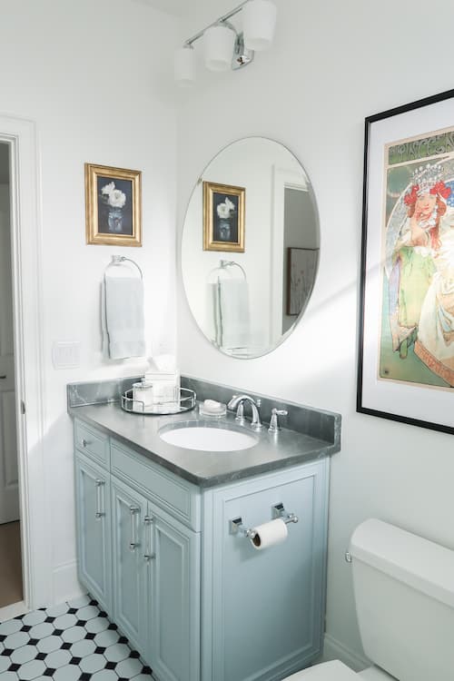 new-vanity-light-polished-chrome-niebla-azul-sherwin-williams-bathroom-cabinet-round-mirror