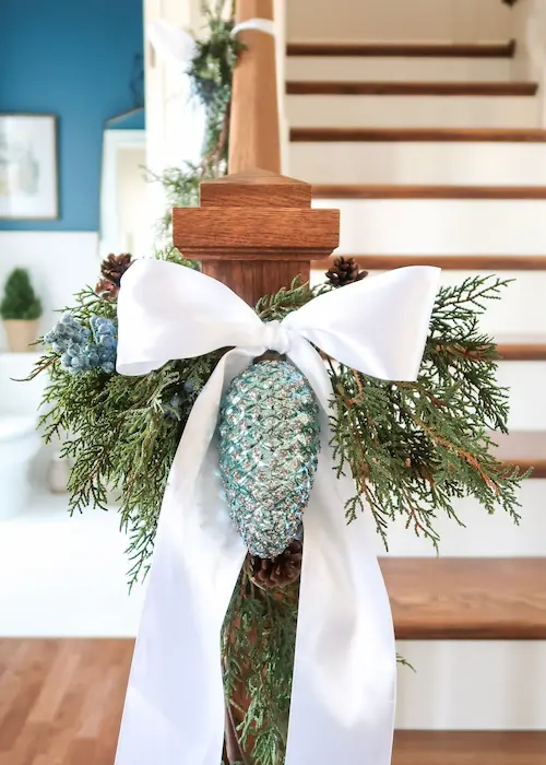 blue-pinecone-ornament-white-bow-garland