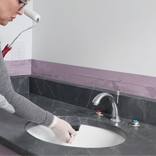 apply-polyurethane-undermount-sink-foam-brush-faux-marble-finish-granite-counter