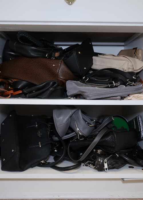 purse-crammed-into-cabinet-unorganized