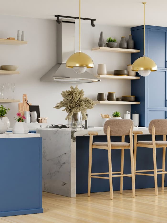 dusty-mid-toned-blue-kitchen-cabinets-gold-hardware
