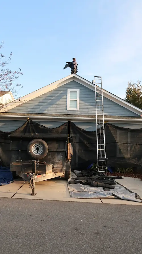 set-up-roof-replacement-dumpster-old-roofing